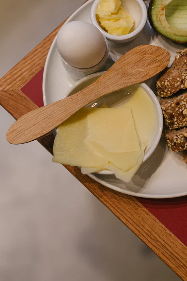 A classic Oslo breakfast: soft boiled egg, cheese, avocado and seeded bread.